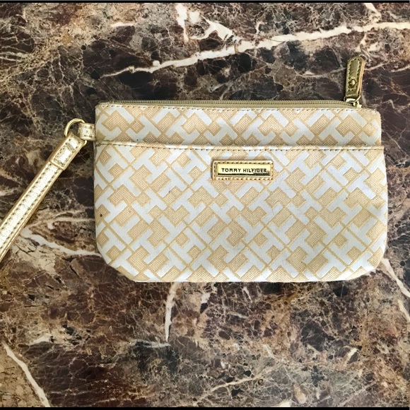 Gold Tommy Hilfiger clutch. - Picture 1 of 3